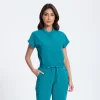 Model wearing the Caribbean Teal Soft Crew mock-neck scrub top