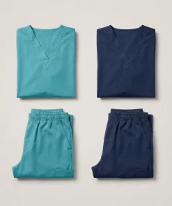 The $99 Team Sample Kit — two complete LumiScrubs scrub sets (top + pant each) in teal and navy
