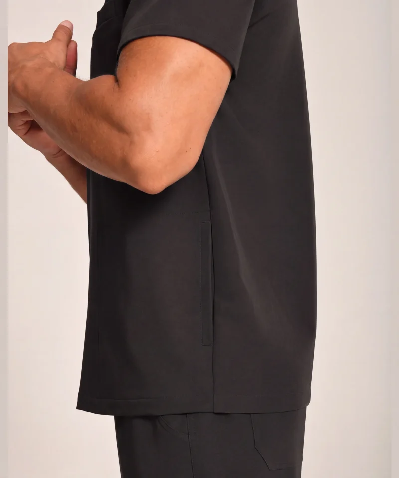 Men's scrub top in Black - pocket detail close-up
