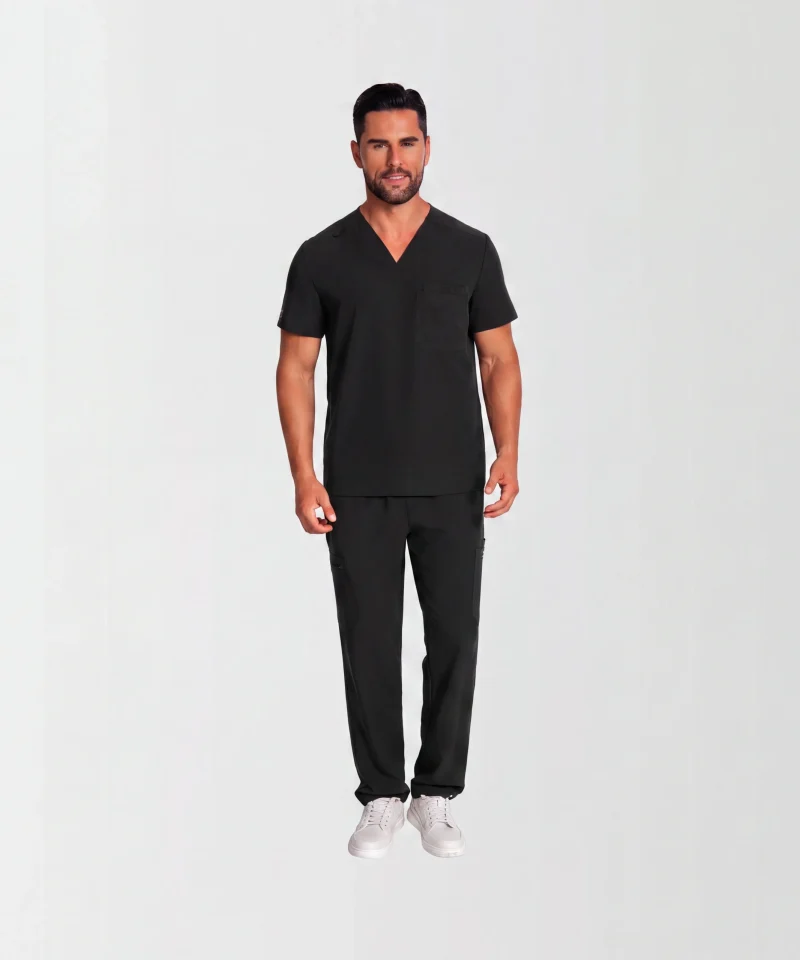 Men's Lumi Core Scrubs — Black, model wearing V-neck top and straight-leg pants