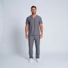 Men's Lumi Core Scrubs — Graphite, model wearing V-neck top and straight-leg pants