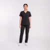 Lumi Core Scrub Set Women's — Black, model wearing V-neck top and straight-leg pants