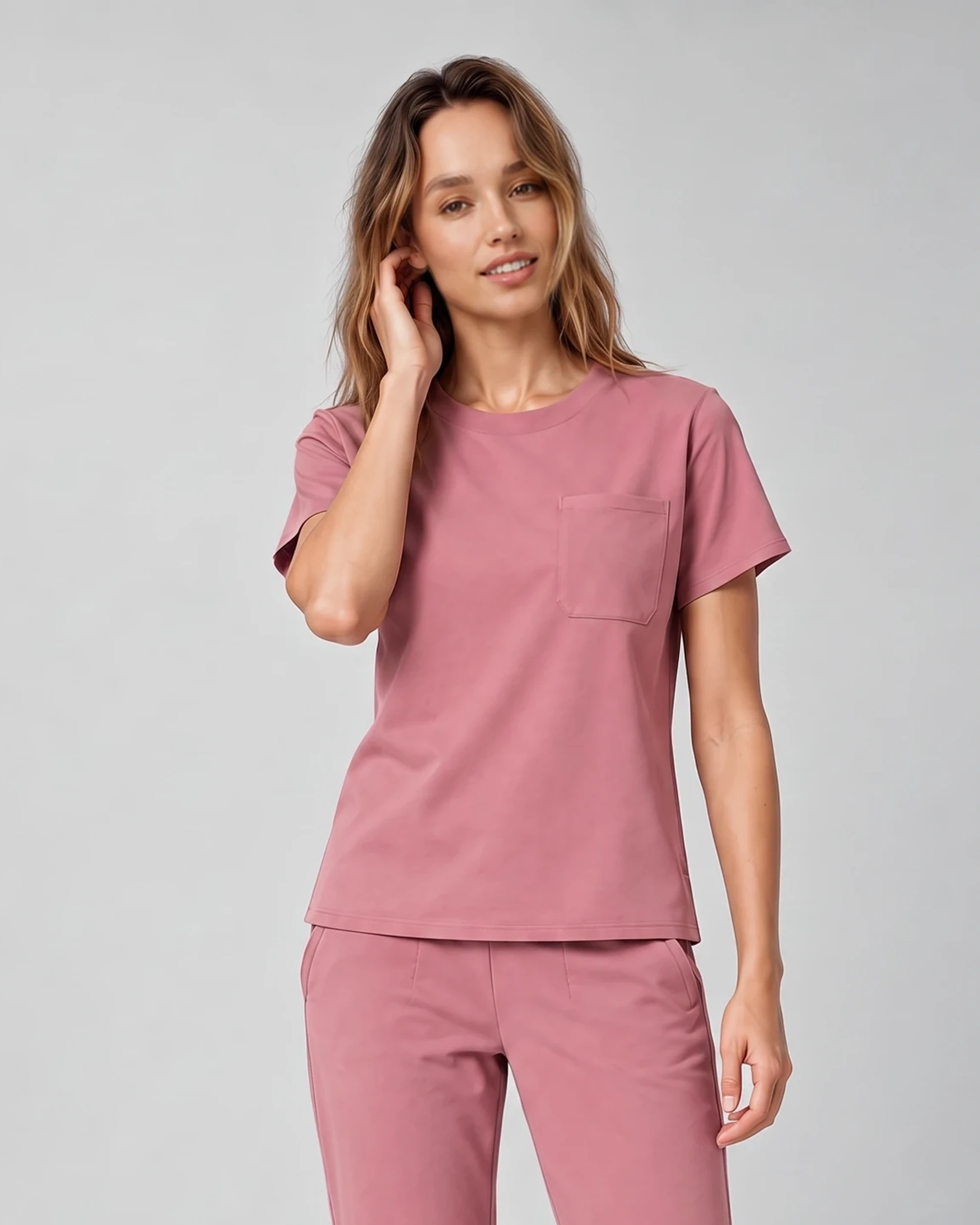 Women's Soft Crew Top in Mauve, front view showing the crew neckline, short sleeves, hem, and chest pocket