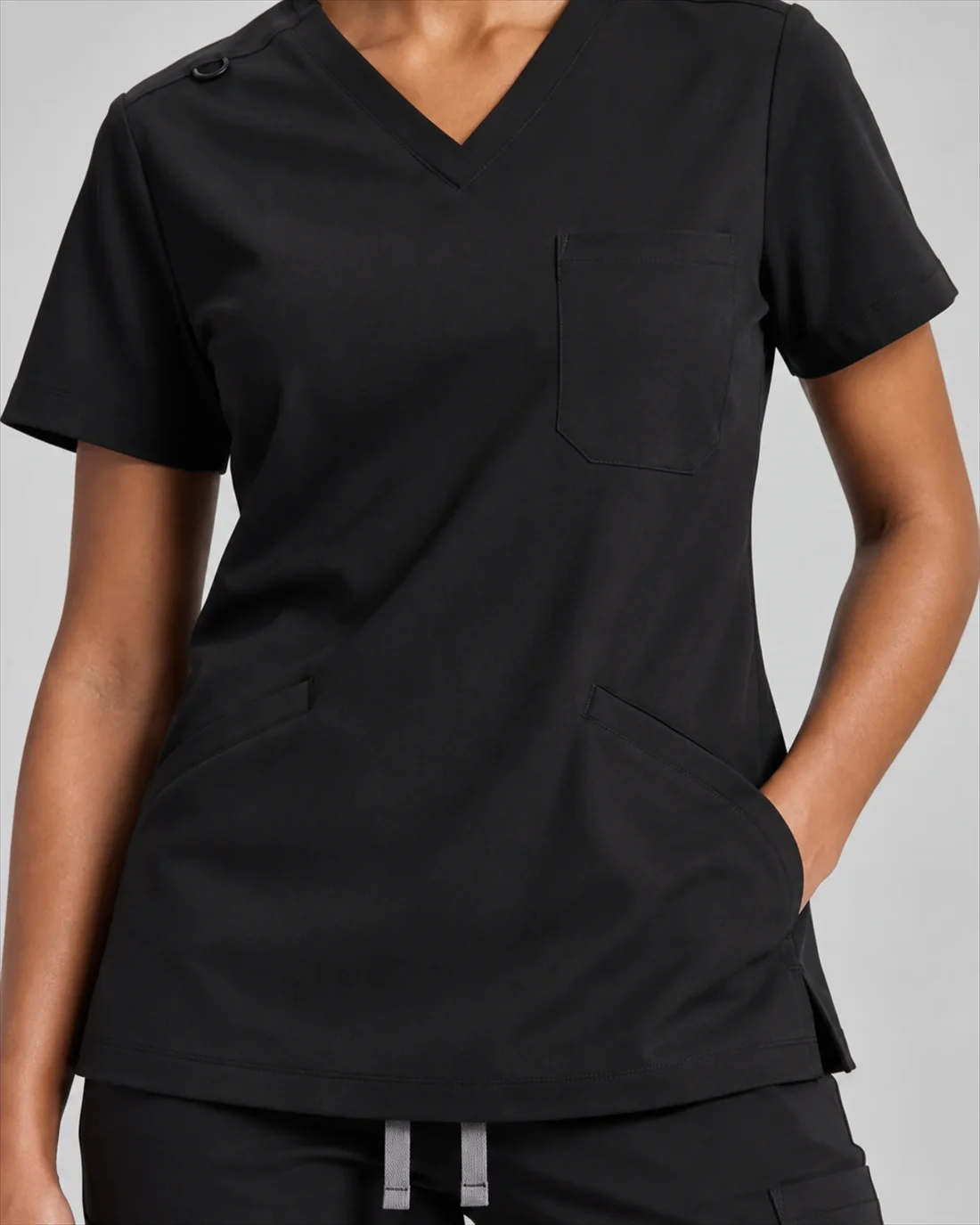 Detail view of the Women's Lumi Core Scrub Set in Black