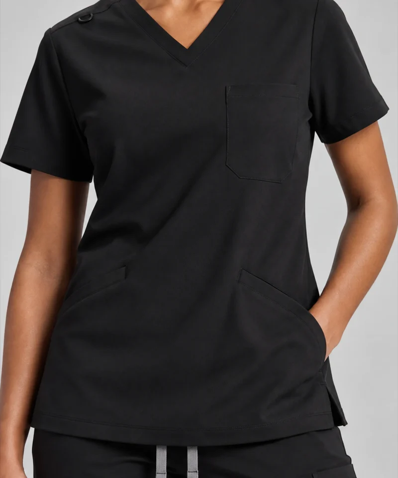 Lumi Core Scrub Set for Women in Black - V-neck and pocket detail