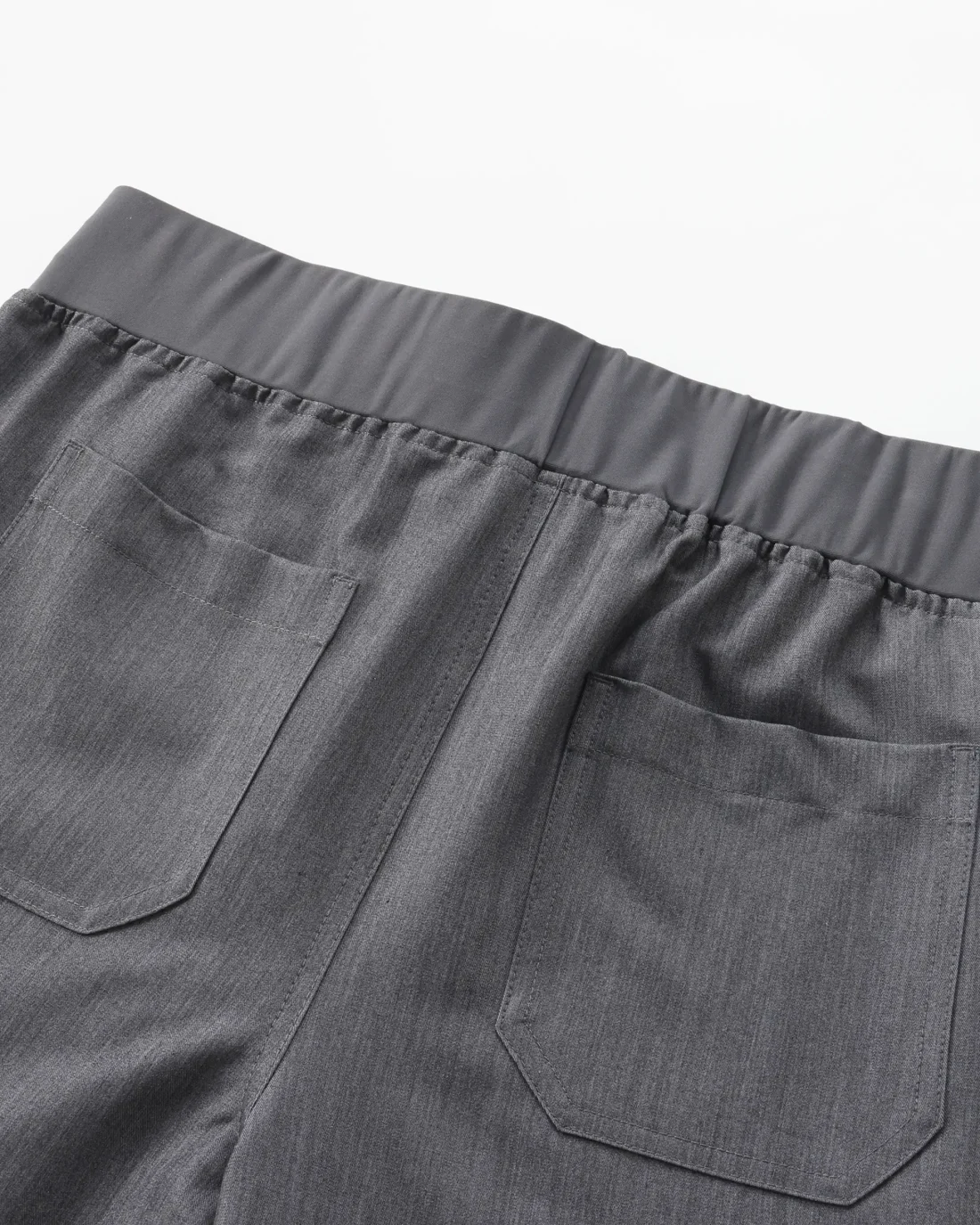 Waistband construction detail on the Men's Lumi Core Scrub Set in Graphite