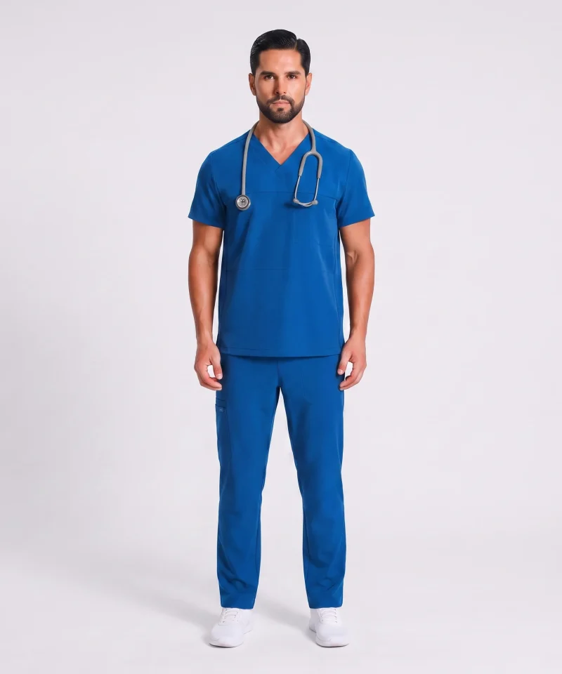 Man wearing the Lumi Motion scrub set in Royal Blue, full-figure front view